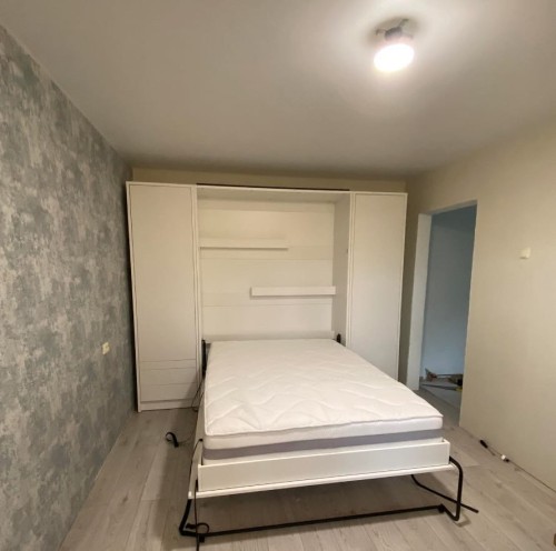 Łóżko w szafie/półkotapczan pionowy GENIUS (biały połysk) 120x200 | 140x200|160x200 z siłownikami gazowymi i szafami do wyboru